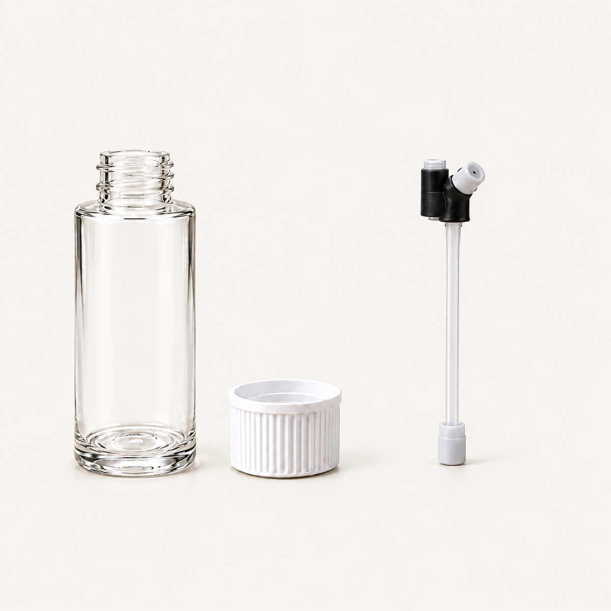 Nira Breeze reserveset met een leeg reservoir van 120 ml, witte afsluitdop en rechtopstaande verstuiver.